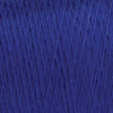 Close-up image of JaggerSpun Maine Line 3/8 Yarn | Mini-cone by Jagger Brothers, Inc. in royal blue, showcasing its tightly woven fibers and smooth texture. The thick and dense Maine wool yarns indicate they are likely suitable for knitting or crocheting various garments or crafts.