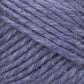 Close-up of Lamb's Pride Bulky Yarn by Brown Sheep reveals thick, soft, blue threads with a slightly fuzzy texture. The tightly wound strands display shades of lighter and darker blue, likely due to natural light and shadow. Ideal for knitters and crocheters, the fibers are clearly visible, highlighting the yarn’s fluffiness and softness.