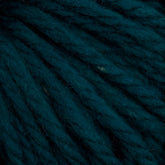 Close-up image of deep teal-colored yarn. The strands are thick and slightly textured, woven together to form a dense, fibrous surface. This hand-dyed Halcyon Yarn Classic Rug Wool | Strand by Caledonian Dye Works is rich and vibrant, highlighting the intricate details of the yarn fibers—perfect for rug weavers seeking quality material.