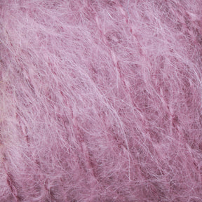 Get a close-up view of the Victorian Brushed Mohair Yarn | Mini Skein by Caledonian Dye Works. This luxurious, soft, fuzzy pink yarn showcases slightly tangled strands that are loosely knit, producing a fluffy and airy appearance reminiscent of classic Victorian yarns.