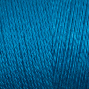 Close-up of bright blue 8/2 Tencel Yarn by Maurice Brassard, wrapped tightly around a Mini Cone. The texture demonstrates the fine, even strands that compose the yarn, with light reflecting off the fibers to give it a subtle sheen—perfect for weaving projects or knitting accessories.