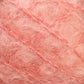 Close-up image of soft, pink Victorian Brushed Mohair Yarn | Mini Skein from Caledonian Dye Works with visible strands and a slightly tangled texture. The natural fibers create a delicate and fluffy appearance suitable for knitting or crafting projects, reminiscent of luxurious mohair often favored in Victorian yarns.