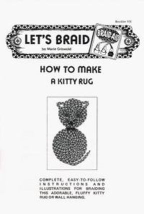 A black and white image of a booklet cover titled "How to Make a Braided Kitty Rug" by Marie Griswold, under the BraidAid brand from Halcyon Yarn. The main text features an illustration of an unusually shaped, round braided rug resembling a cat, with subtext providing complete instructions for cat lovers on calculating fabric quantities.