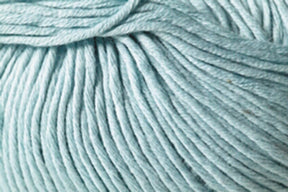 Close-up image of light blue Jo Sharp Soho Summer DK Cotton Yarn by Kingfisher Yarn & Fibre, wound into a ball, showcasing the texture and strands neatly aligned together.