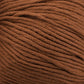 Close-up of a skein of Jo Sharp Soho Summer DK Cotton from Kingfisher Yarn & Fibre. The texture is visible, showcasing its smooth and tightly woven strands. The color is a rich, warm brown, perfect for creating lightweight summer garments.