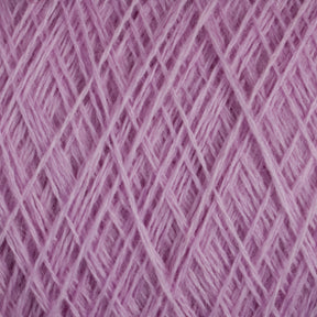 Close-up view of pink Jagger Brothers, Inc. JaggerSpun Maine Line 2/20 Yarn strands intricately wound together, forming a dense, crisscross pattern. The texture and detail of the medium-grade wool are clearly visible, highlighting the softness and structure of the yarn on this large cone.