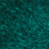 A close-up image of teal-colored curly yarn from Caledonian Dye Works' Victorian Bouclé Mohair Yarn collection, showcasing its rich texture and intricate loops. The fibers appear soft and fluffy, embodying the essence of Mohair Bouclé.