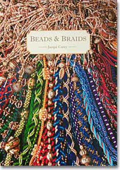 The image showcases the cover of a book titled "Beads & Braids" by Jacqui Carey, published by Lacis. The cover features a vibrant array of intricately designed beads and braided materials in diverse colors, including green, blue, red, and gold.