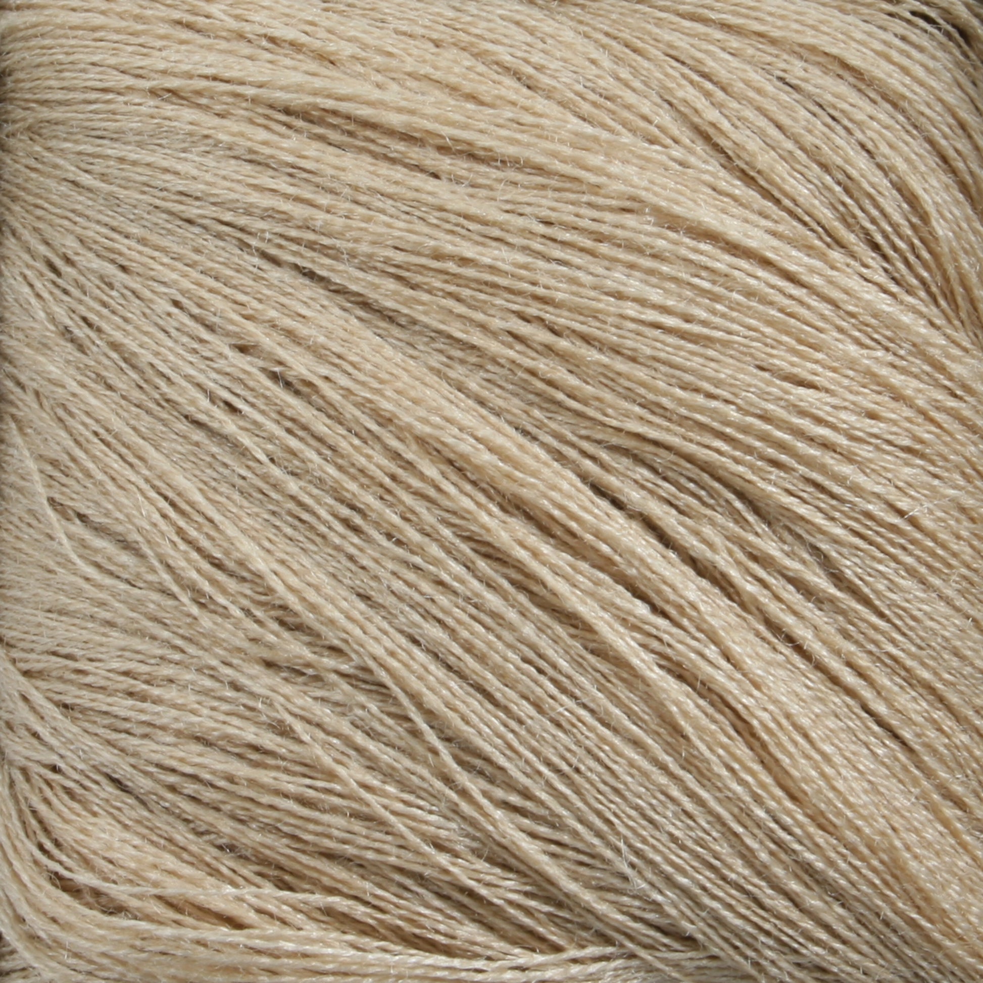 Close-up of beige threads tightly arranged in parallel, displaying the texture and fine details of the fibers. The threads, made from **Henry's Attic 2/70 Silk Yarn**, appear silky and smooth with a slight sheen, creating a sense of softness and fragility in the image.