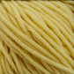 Close-up of a bundle of Plymouth Select Worsted Merino Superwash yarn by Plymouth Yarn Co. The yellow yarn is tightly wound together, making its texture and individual strands clearly visible and showcasing excellent stitch definition. The bright shade of yellow gives the fabric a vibrant and warm appearance.