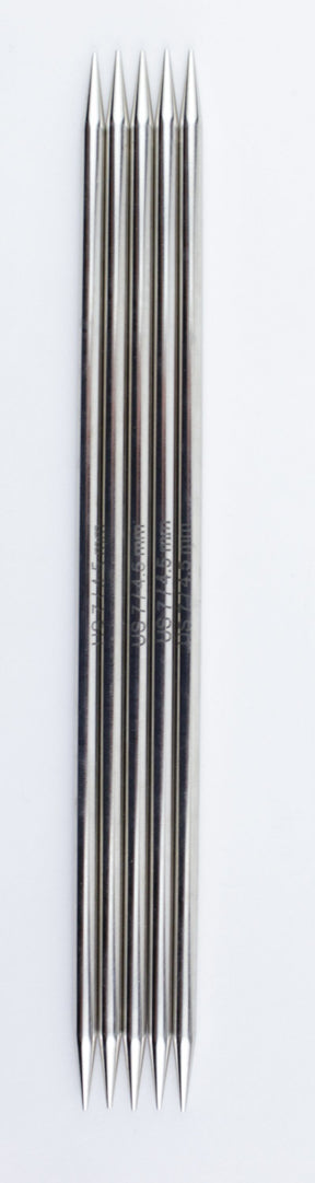 A set of six high-quality Accessories Unlimited Nova Platina Double-Point Knitting Needles aligned in parallel on a white background. Each needle is smooth and reflective, with points on both ends, appearing identical in size and looking new, unblemished, and unused.