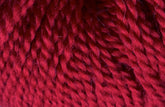 Close-up image of deep red textured yarn, showing the interwoven fibers and strands. The image highlights the intricate details and the vibrant color of Jo Sharp Alpaca Kid Lustre yarn from Kingfisher Yarn & Fibre.