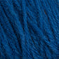 Close-up image of blue 100% Halcyon Deco Rug Wool fibers intertwined. The Caledonian Dye Works yarn has a slightly fuzzy texture with individual strands visible, giving it a rich, vibrant blue appearance. The image showcases the detailed and coarse texture of this versatile wool yarn.