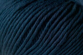 Close-up image of Kingfisher Yarn & Fibre's Jo Sharp Soho Summer DK Cotton in dark blue. The strands are tightly coiled and parallel to each other, creating a textured pattern. The close-up view highlights the knitted texture and softness of the DK weight gauge yarn fibers, perfect for summer projects.