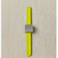 A minimalist Maker's Keep Magnetic Bracelet from Cocoknits, featuring a silver square face and a bright yellow silicone slap bracelet, is placed on a textured beige surface. The bracelet is designed with a sleek, modern look, and the band appears to be made of flexible material.