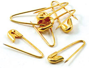 A collection of Bryson Distributing, Inc.'s versatile Brass Coiless Safety Pins, some closed and others open, arranged in a scattered manner on a white background.