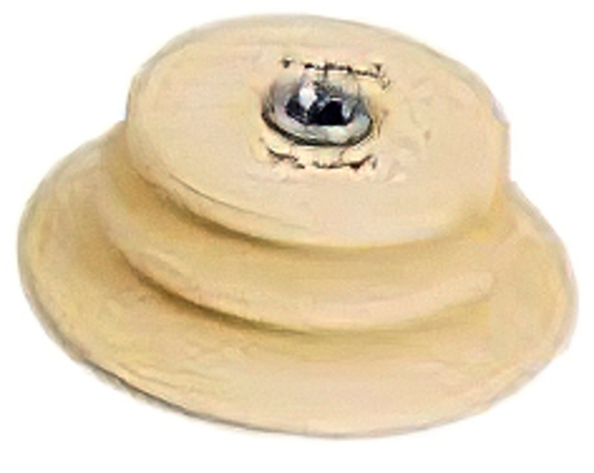 The Schacht Whorl, a product from Schacht Spindle Co., is a round beige object with two concentric ridges and a central metallic stud. Its smooth and rounded surface gives it an appearance similar to that of a pulley or mechanical component.