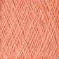 Close-up image of a spool of Jagger Brothers, Inc.'s JaggerSpun Maine Line 2/20 Yarn | Large Cone, showcasing a peach-colored hue. The medium-grade wool is tightly wound, highlighting its soft and fibrous texture. The yarn strands create a crisscross pattern throughout the image.