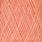 Close-up image of a spool of Jagger Brothers, Inc.'s JaggerSpun Maine Line 2/20 Yarn | Large Cone, showcasing a peach-colored hue. The medium-grade wool is tightly wound, highlighting its soft and fibrous texture. The yarn strands create a crisscross pattern throughout the image.