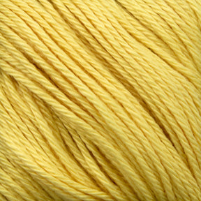 Close-up image of Cascade Ultra Pima Cotton Yarn in yellow, showcasing the soft hand and twisted strands of its fibers.