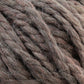 A close-up view of Baby Alpaca Grande by Plymouth Yarn Co., showcasing ultra-soft, thick, textured grayish-brown yarn. The intertwined strands and fibrous details highlight its bulky weight, making it appear soft and slightly fuzzy—perfect for knitting or crocheting projects.