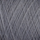 Close-up image of gray JaggerSpun Maine Line 3/8 Yarn wound tightly in a ball, showcasing the fine texture and overlapping patterns of the strands. The soft medium grade wool from Jagger Brothers, Inc. has a slightly fuzzy appearance, indicative of worsted spun yarns or a similar material.