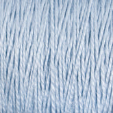 A close-up image of soft, light blue yarn strands. The 10/2 Pearl Cotton Yarn from Supreme Corp. is neatly arranged on a mini-cone, showcasing its fibrous texture and twisted pattern. The background is out of focus, emphasizing the smooth and delicate surface of the yarn.