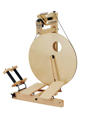 Here's an image of the Louët S10 Concept Double Treadle Spinning Wheel w/sliders by Louët Inc. It features a modern wooden upright wheel with a large circular wheel, two foot pedals at the base, and a tensioning mechanism on top. The spinning wheel boasts a sleek, minimalist design with a natural wood finish.