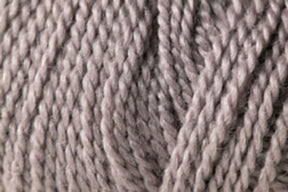 Close-up of Jo Sharp Alpaca Kid Lustre knitting yarn from Kingfisher Yarn & Fibre, showcasing a detailed texture of twisted and interwoven fibers. The strands, a blend of Merino and Kid Mohair, appear thick and sturdy, suitable for crafting or knitting projects. The image emphasizes the soft and fibrous nature of the yarn.