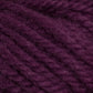 Close-up image of thick, textured Halcyon Yarn Classic Rug Wool in a rich, deep purple hue. The strands by Caledonian Dye Works are loosely twisted together, showcasing their fibers. The image highlights the yarn's softness and woven detail, perfect for weavers seeking high-quality Rug Wool.