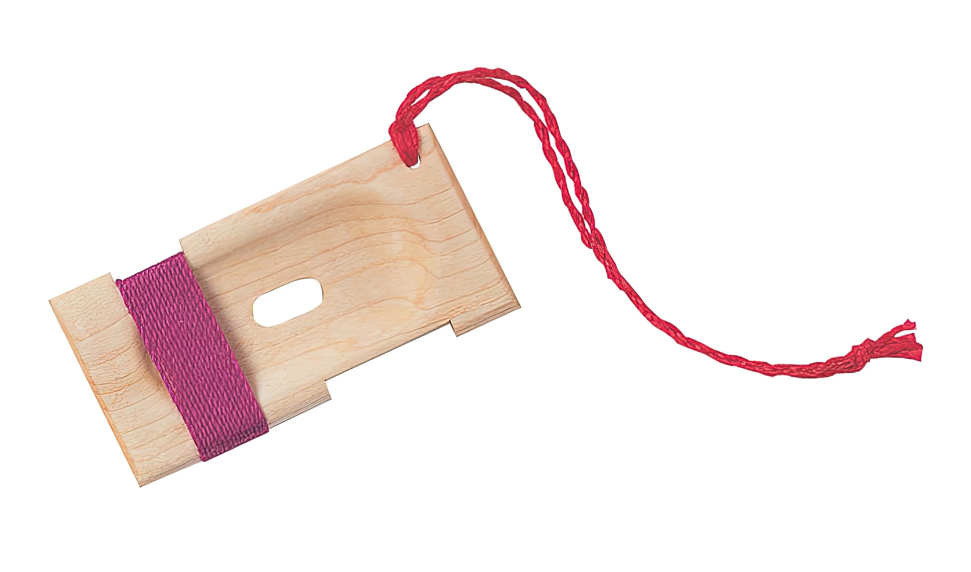 The Schacht Dizzy Yarn Gauge from Schacht Spindle Co. is a rectangular wooden tool with rounded edges, featuring a small, elongated hole in the center. It is partially wrapped with a purple string and has a red braided string attached to one end, making it easy to hang or hold. This yarn gauge is perfect for worsted spinning projects.
