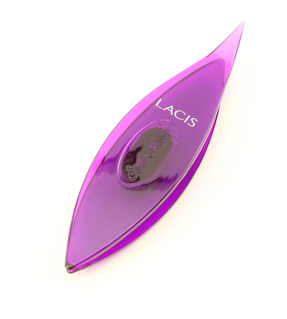 A transparent, eye-shaped Sew Mate Tatting Shuttle, purple in color and adorned with the "Sew Mate" brand name. This 3-inch plastic shuttle includes a central indent for holding thread and an internal mechanism to control tension.