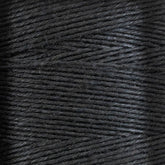 Close-up of 16/5 Linen Rug Lacing (Black) tightly wrapped around a mini-cone. The texture of the lacing, supplied by Stuart C. Hurlbert & Co., is clearly visible, with a slightly shiny surface and fine fibers intertwined. The image focuses on the details of the lacing's weave and surface, highlighting its smoothness and strength for crafting projects.