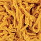 A close-up image of Harrisville Potholder Loops from the Traditional Size Mini Pack by Friendly Loom shows a pile of twisted yellow fabric strips or yarn, creating a dense and textured pattern. The material appears soft and has a consistent, bright yellow color throughout, resembling cotton loops commonly used in traditional potholder looms.