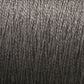 A close-up image of a mini-cone of dark grey 10/2 Pearl Cotton Yarn by Supreme Corp. The yarn is tightly wound, appearing smooth and uniform with a subtle sheen reflecting light. Renowned for its colorfastness, the texture is consistent, showing fine individual strands twisted together.