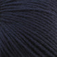 Close-up of a dark blue ball of Baby Blatt by Anny Blatt, showcasing the detailed texture of the tightly wound fibers. The yarn appears soft and slightly fuzzy with a rich, deep hue. This fingering weight yarn from Essentially Felt Studio & Fine Yarn is machine washable, making it perfect for delicate projects.