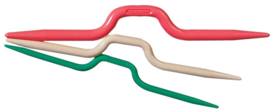 Three Bent Cable Stitch Holders from Accessories Unlimited are arranged in a staggered pattern, colored red, white, and green. Each holder is slightly bent in the middle, creating a dip that aids in holding stitches while knitting cables. The brand name "Accessories Unlimited" is visible on them, and they come in different sizes to suit various knitting needs.