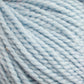 Close-up image of light blue Norumbega yarn by Caledonian Dye Works, showcasing the soft, twisted fibers. The yarn appears thick and fluffy, with slight variations in the shade of blue and a hint of fuzziness along the strands. Made from 100% U.S. wool, it promises a durable fabric for your crafting needs.