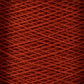 Close-up image of a spool of 10/2 Pearl Cotton Yarn on a mini-cone by Supreme Corp. The yarn is neatly wound in overlapping layers, creating a textured and uniform pattern. The rich red color is consistent throughout, ensuring colorfastness and giving the mini-cone a vibrant and visually appealing appearance.