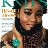 Magazine cover of "Interweave Knits" Summer 2022 issue by Golden Peak Media. A woman models a knitted scarf featuring blue and brown patterns. The cover headlines include "Op-Art Awesome," "Crafting a Career," "Art-Inspired Patterns," and "5 Projects with a Backstory." Price and barcode are at the bottom.