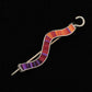 The Stripe Wavy Shawl Pin by Bonnie Bishoff Designs is a silver decorative pin featuring a uniquely designed, wavy, multicolored inlay with vibrant shades of red, orange, and purple on a black background. Crafted by the local artisan brand Bonnie Bishoff, this pin is perfect for accessorizing knitted wearables or as a thoughtful handmade gift.