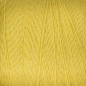 Close-up image of Maurice Brassard's 8/2 Cottolin Organic Yarn in yellow, showcasing the intricate details of the cotton linen blend fibers and the way they are intertwined. The soft, smooth texture highlights the light yellow hue, making it perfect for your four shaft loom Cottolin Tea Towel Kit.