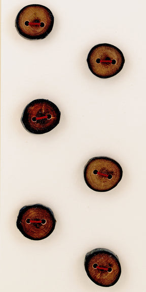 The Six Buttons by Favour Valley Woodworking feature a vertical arrangement of locally-sourced brown wooden buttons, each with two holes. These buttons, evenly spaced against a plain white background, highlight their natural wood grain and darkened outer edges beautifully.