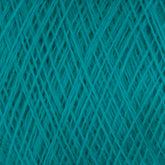 Close-up image of a tightly wound ball of teal JaggerSpun Maine Line 2/20 Yarn | Large Cone by Jagger Brothers, Inc., showing the intricate crisscross patterns of the fibers. The texture is soft and slightly fuzzy, and the vibrant teal color is consistent throughout.