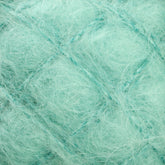 Close-up view of the Victorian Brushed Mohair Yarn in light turquoise, showing fine and wispy fibers intertwined. The texture appears soft and delicate, forming a fuzzy and airy surface. The image captures the intricate details of this luxurious yarn's structure from Caledonian Dye Works in its mini skein form.