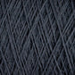 Close-up image of dark grey Jagger Brothers, Inc. JaggerSpun Maine Line 3/8 Yarn wound into a dense ball. The strands are tightly interwoven, creating a textured pattern of crisscrossing lines. The soft medium grade wool appears slightly fuzzy, enhancing its cozy appeal.