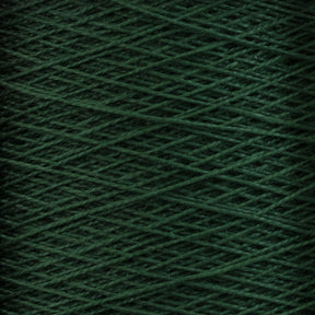 Close-up image of a mini-cone of deep green, 10/2 Pearl Cotton Yarn from Supreme Corp. The yarn is tightly wrapped in an orderly crisscross pattern, highlighting its texture and consistency. The rich green color stands out prominently with fibers that appear soft and slightly fuzzy.