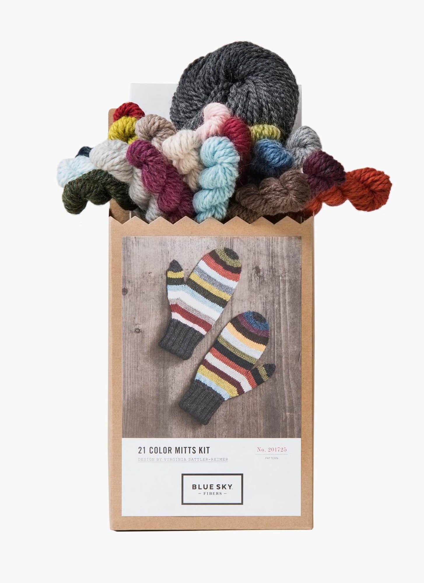 A knitting kit box labeled "Blue Sky Fibers 21 Colors Mittens Kit," by Blue Sky Fibers, features multi-colored Woolstok yarn skeins peeking out from the top. The front of the box showcases a photo of a colorful knitted mitten pattern in various stripes, suggesting the vibrant final product this kit will create.