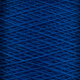 Close-up image of Supreme Corp's 10/2 Pearl Cotton Yarn in dark blue, wound in a crisscross pattern. The texture of this versatile mini-cone yarn is clearly visible, showcasing its fibrous and intertwined nature. The deep blue color is rich, uniformly distributed throughout the strands, and exhibits excellent colorfastness.