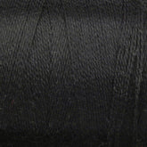 Close-up image of a spool of Maurice Brassard 8/2 Tencel Yarn | Mini Cone in black, featuring a textured surface. The yarn appears tightly wound and smooth, displaying slight variations with fine strands and fibers, making it ideal for weaving projects.